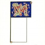 Illuminated letter M, White vine style, for the month of March.